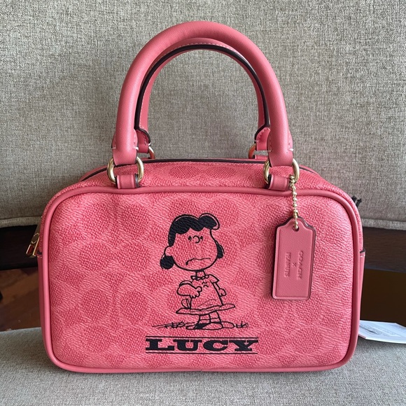NWT！Coach X Peanuts Lucy Satchel Crossbody Bag In Signature（CBJ62）fast shipping - Picture 1 of 7